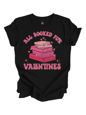 A black short sleeve shirt with a fun "All Booked for Valentines" design, showcasing pink books and hearts. Unisex fit.