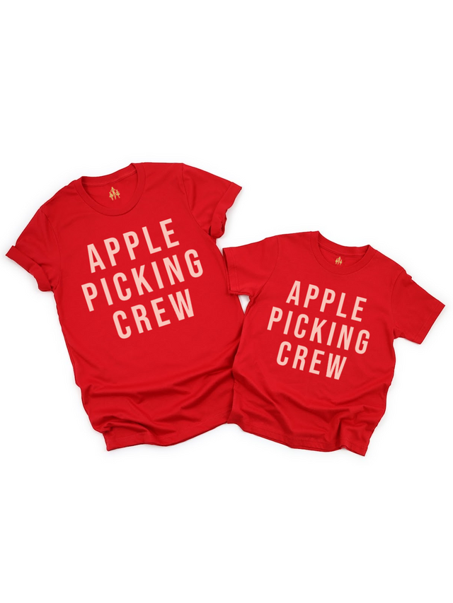 Matching red Apple Picking Crew shirts for mom and child – fall family outfit flat lay