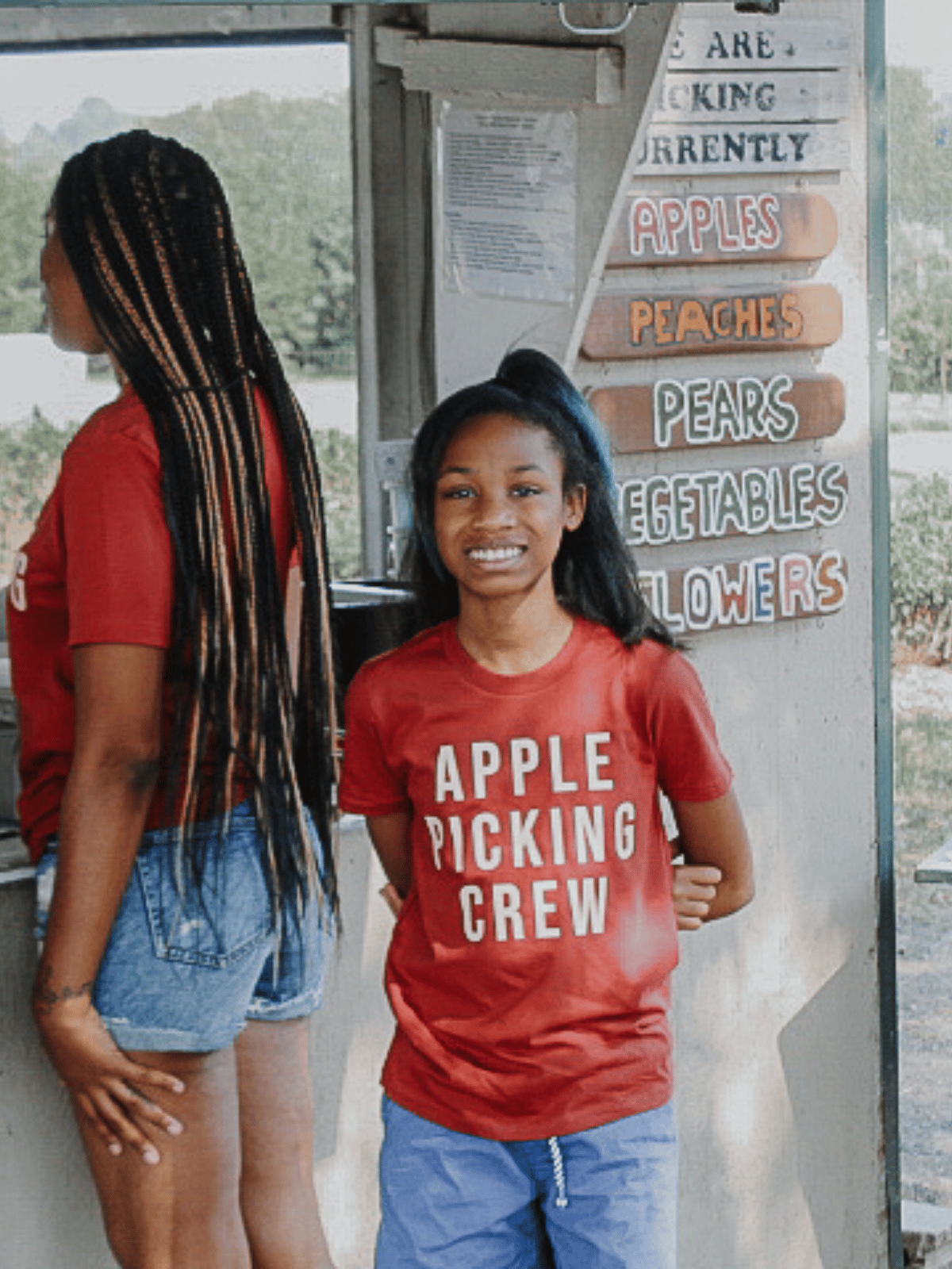 Kid Smiling Wearing Red Apple Picking Crew Shirt