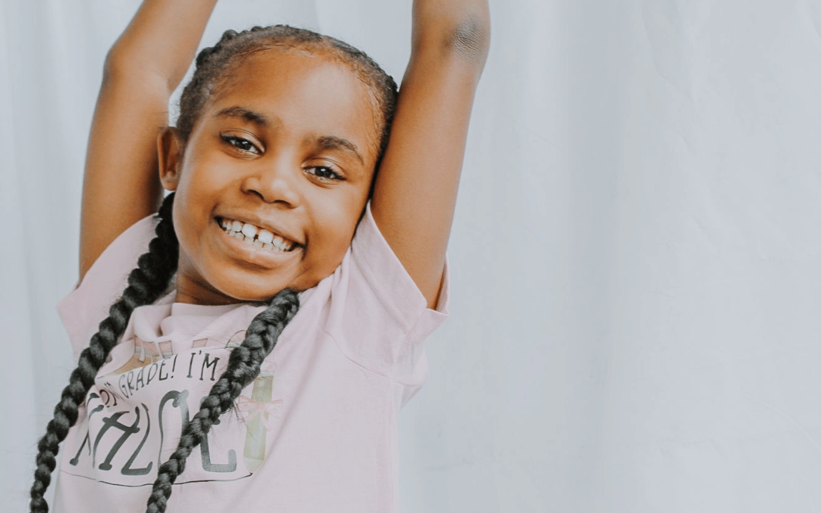 Young girl wearing personalized first day of school shirt