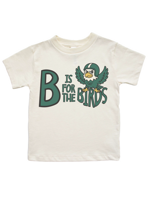 An off-white short-sleeve kids' t-shirt featuring a green and yellow graphic that reads 'B IS FOR THE BIRDS' alongside a cartoon bird mascot.
