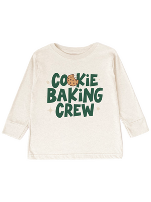 An off-white long-sleeve t-shirt with a graphic that reads 'Cookie Baking Crew' in dark green letters, featuring a small chocolate chip cookie illustration, displayed on a solid white background.