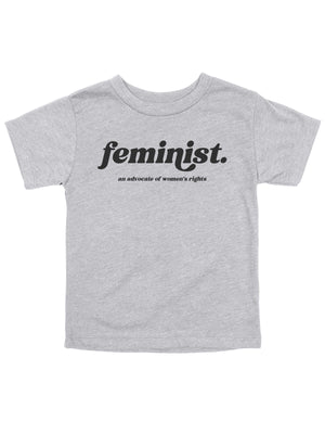 short sleeve heather gray kids shirt that reads Feminist. an advocate of women's rights in retro font