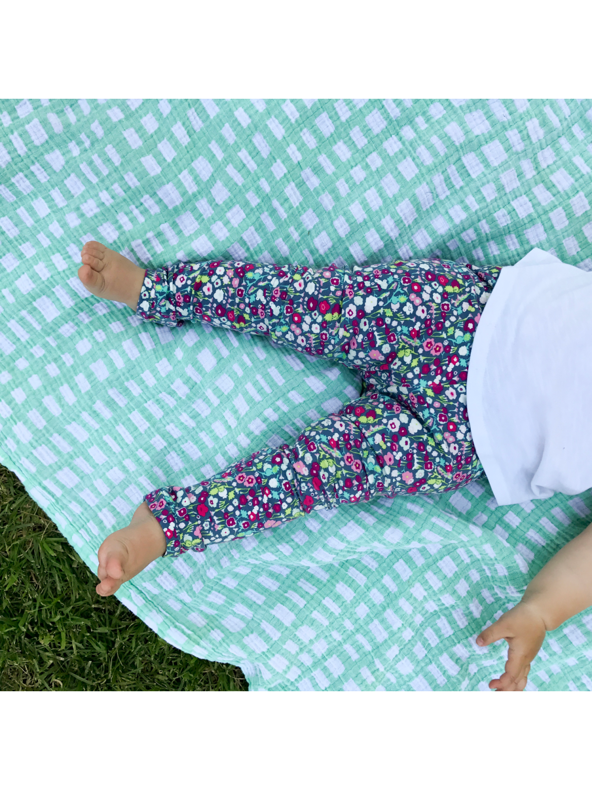 Flat lay of handmade kids floral leggings with elastic waistband from the Mommy and Me collection