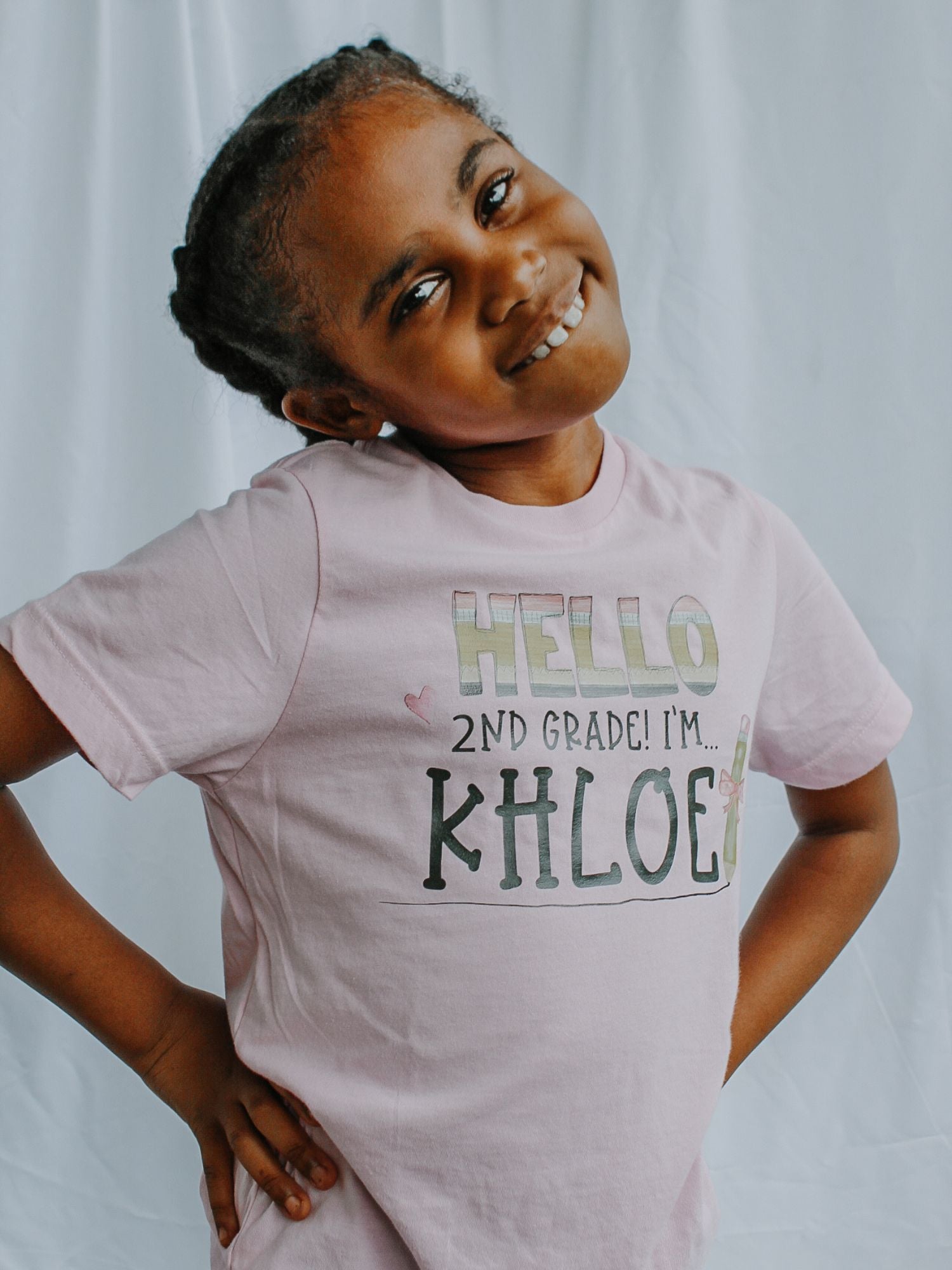 Personalized pink back to school tee for girls with heart and pencil graphic