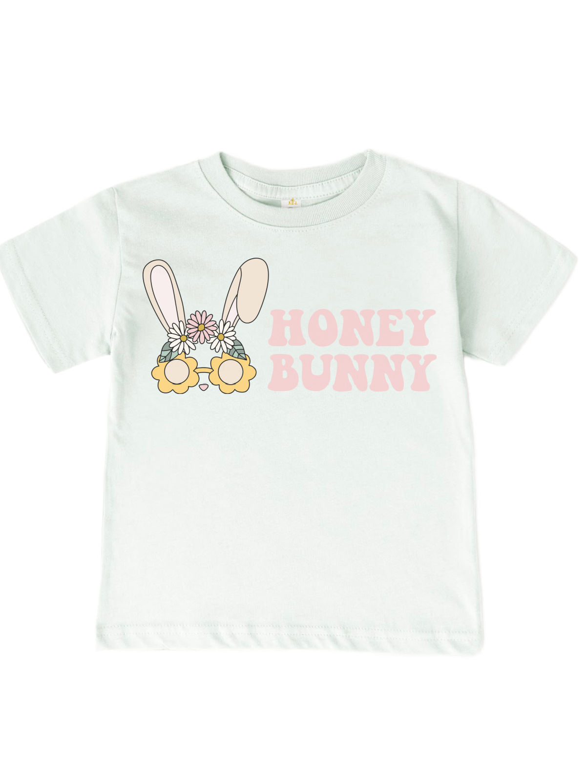 Girls' Easter shirt in honey dew green featuring a cute boho bunny with flower sunglasses and "Honey Bunny" text. Soft cotton, short sleeve, unisex fit.

