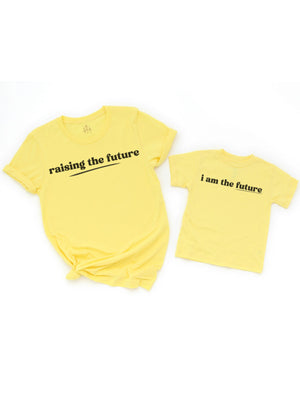 "Raising the Future" on the adult shirt and "I Am the Future" on the child’s shirt. 100% cotton, soft and breathable.