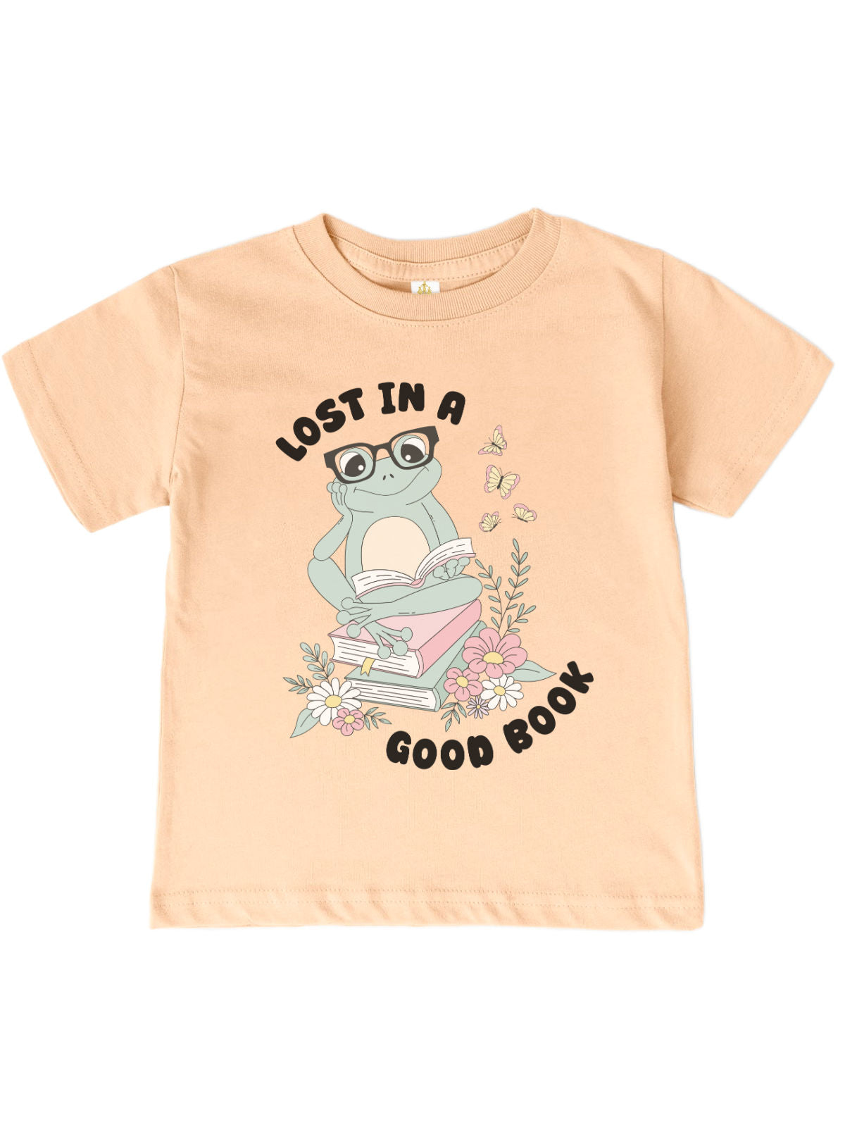 A dusty blue kids spring t-shirt featuring a cute frog with glasses reading on a stack of books, surrounded by flowers and butterflies.