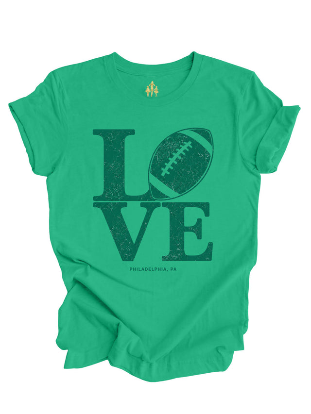 LOVE Football Philadelphia shirt in Kelly Green featuring a vintage football design inspired by the iconic LOVE sculpture.