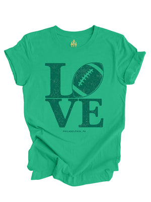 LOVE Football Philadelphia shirt in Kelly Green featuring a vintage football design inspired by the iconic LOVE sculpture.