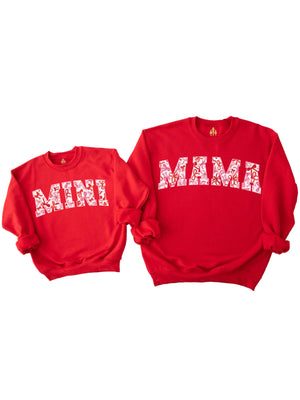 Red "Mama" and "Mini" matching Valentine’s Day sweatshirts featuring pink and red coquette bows design, displayed flat on a white background. Perfect for mommy and me outfits.