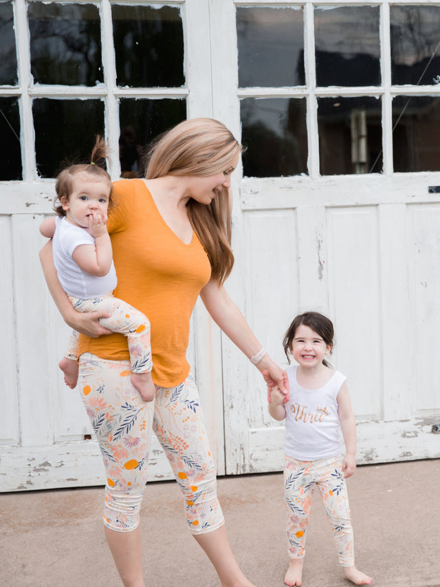 Mom with two daughters in matching bottoms, leggings