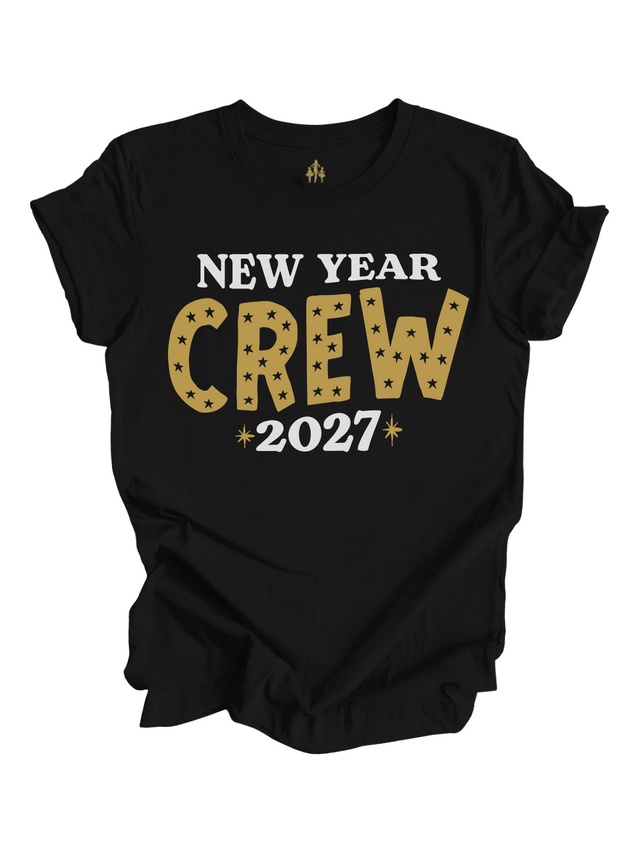 A black short-sleeve crewneck t-shirt with a graphic print reading 'NEW YEAR CREW 2027' on the front. The word 'CREW' is styled in a gold glitter texture filled with small black stars, while 'NEW YEAR' and '2027' are in white block letters.