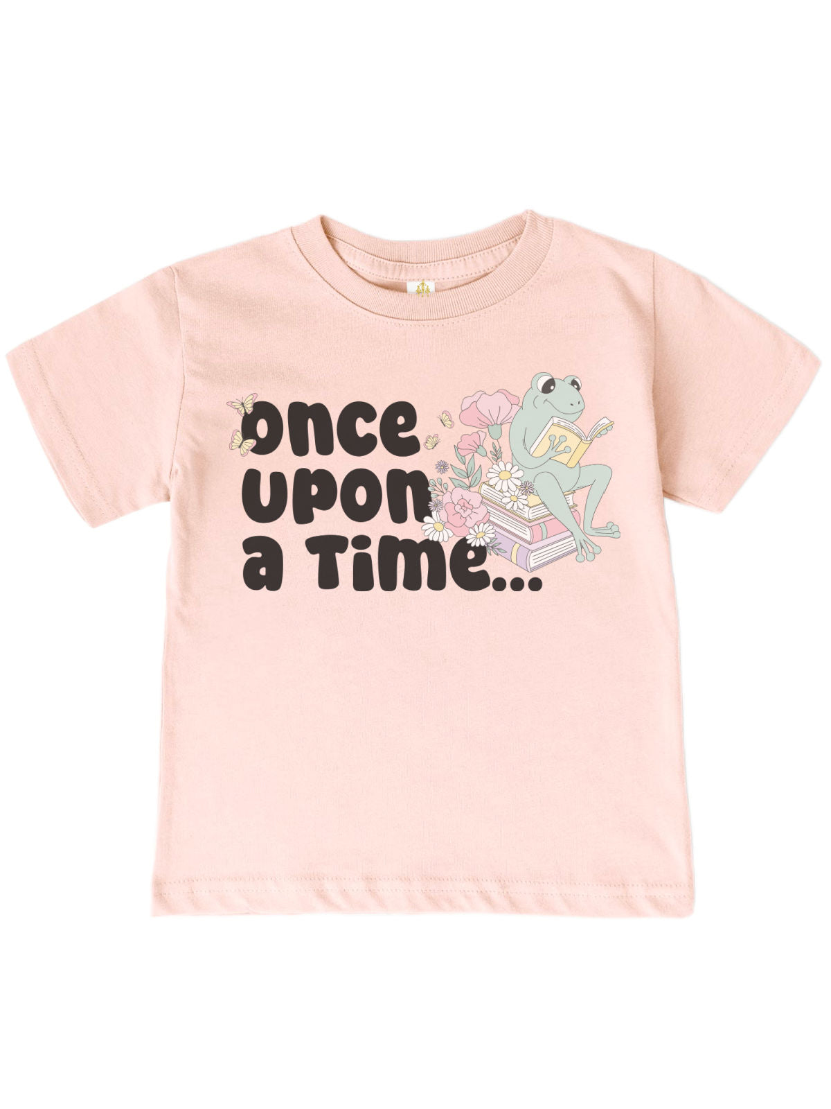 Kids' spring shirt in banana yellow featuring a whimsical frog reading on a stack of books with "Once Upon a Time" text. Soft 100% cotton, unisex fit.