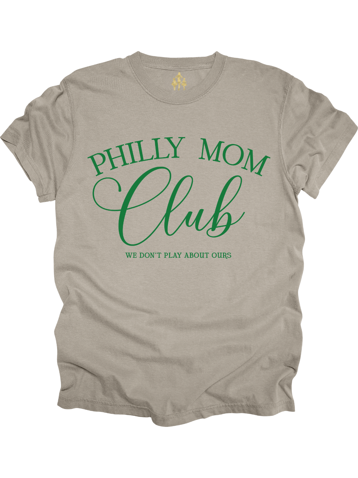 Sand-colored t-shirt with green text that reads "Philly Mom Club – We Don’t Play About Ours"