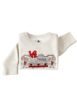 Folded kids beige sweatshirt embroidered with Philly themed Thanksgiving sweatshirt