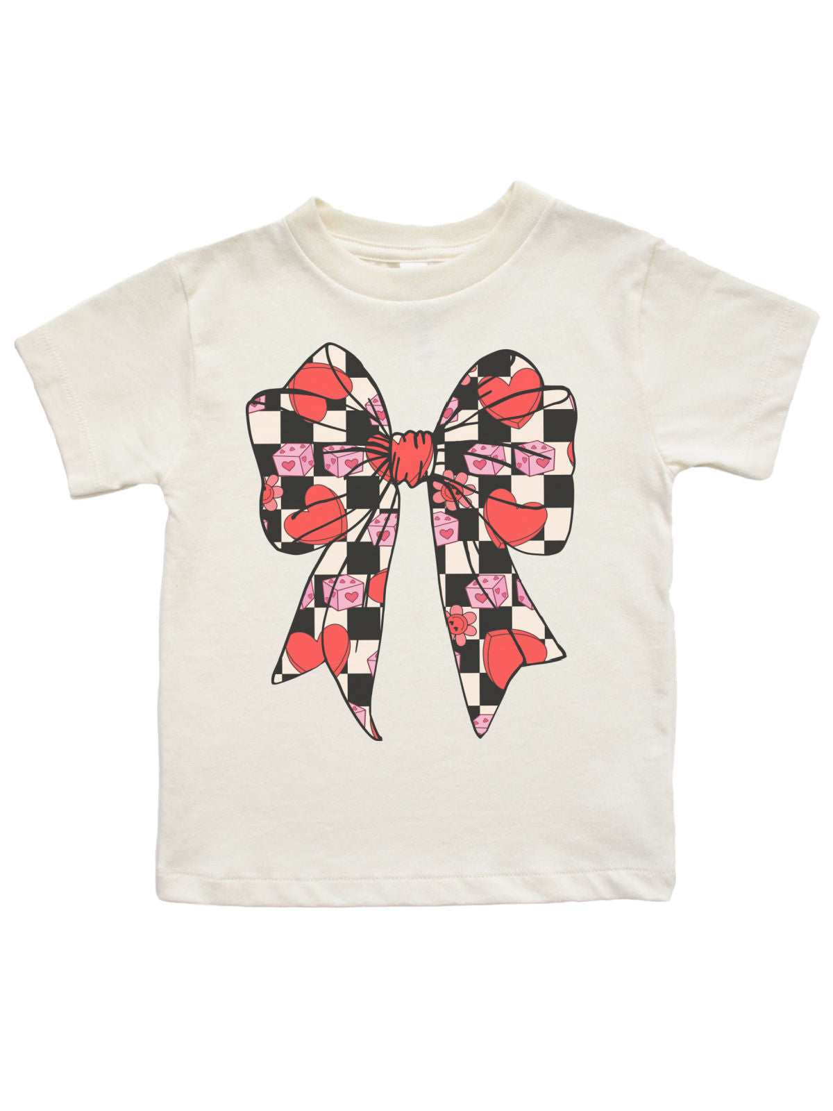 Natural-colored girls Valentine shirt featuring a retro bow design with checkered hearts, pink dice, and flowers, displayed flat on a white background.