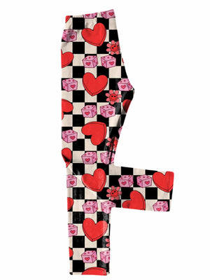 Retro checkered girls' Valentine leggings featuring red hearts, pink dice, and flowers on a black and cream background, made with custom-printed fabric.