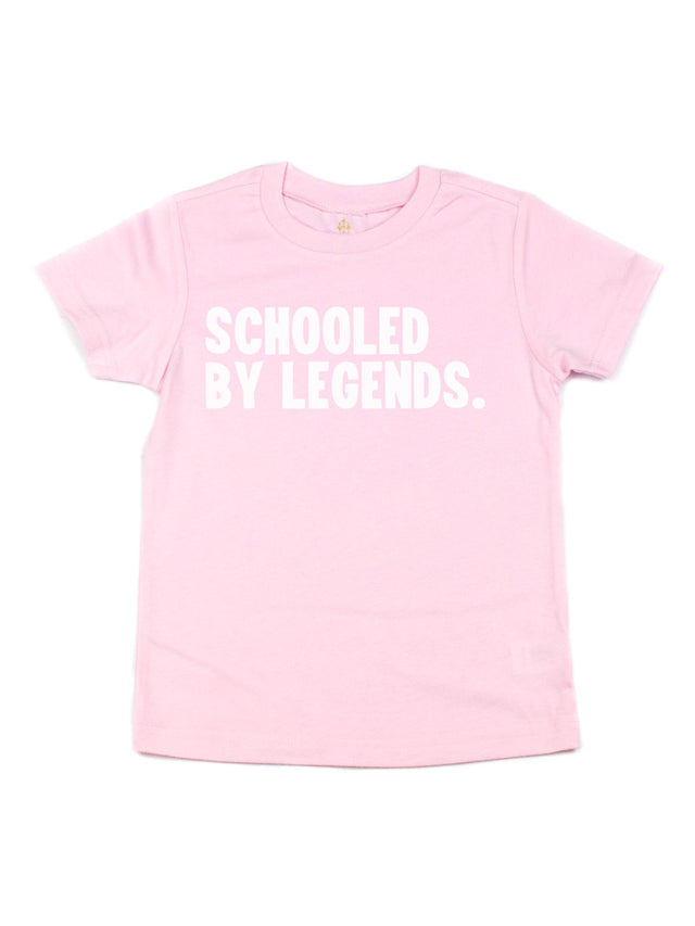 Pink "Schooled by Legends" t-shirt for girls, honoring trailblazing women