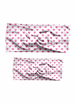 Mommy and me pink and white hearts matching headband set, handmade with custom double brushed poly fabric for Valentine's Day.