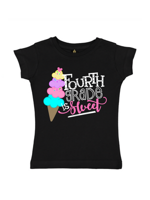 A black short-sleeve t-shirt for girls, featuring a colorful graphic of a four-scoop ice cream cone next to the text 'FOURTH GRADE IS Sweet' in white, black, and pink lettering.