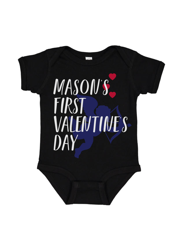 Short sleeve infant bodysuit that reads Mason's First Valentine's Day in festive white font with blue cupid and red hearts