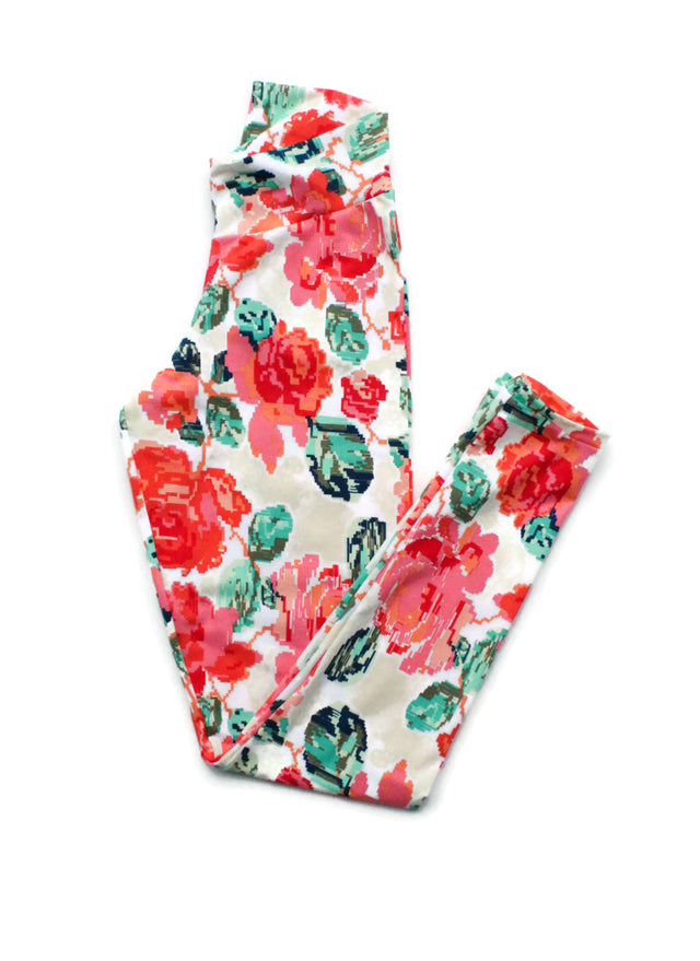 Women's handmade cotton leggings in coral pink floral print with yoga waistband
