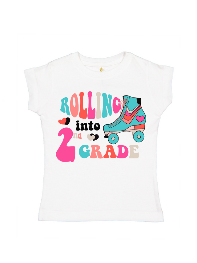 White girls back to school shirt with colorful “Rolling into 2nd Grade” text and retro roller skate design – also available in white, pink, and blue for 1st through 8th grade