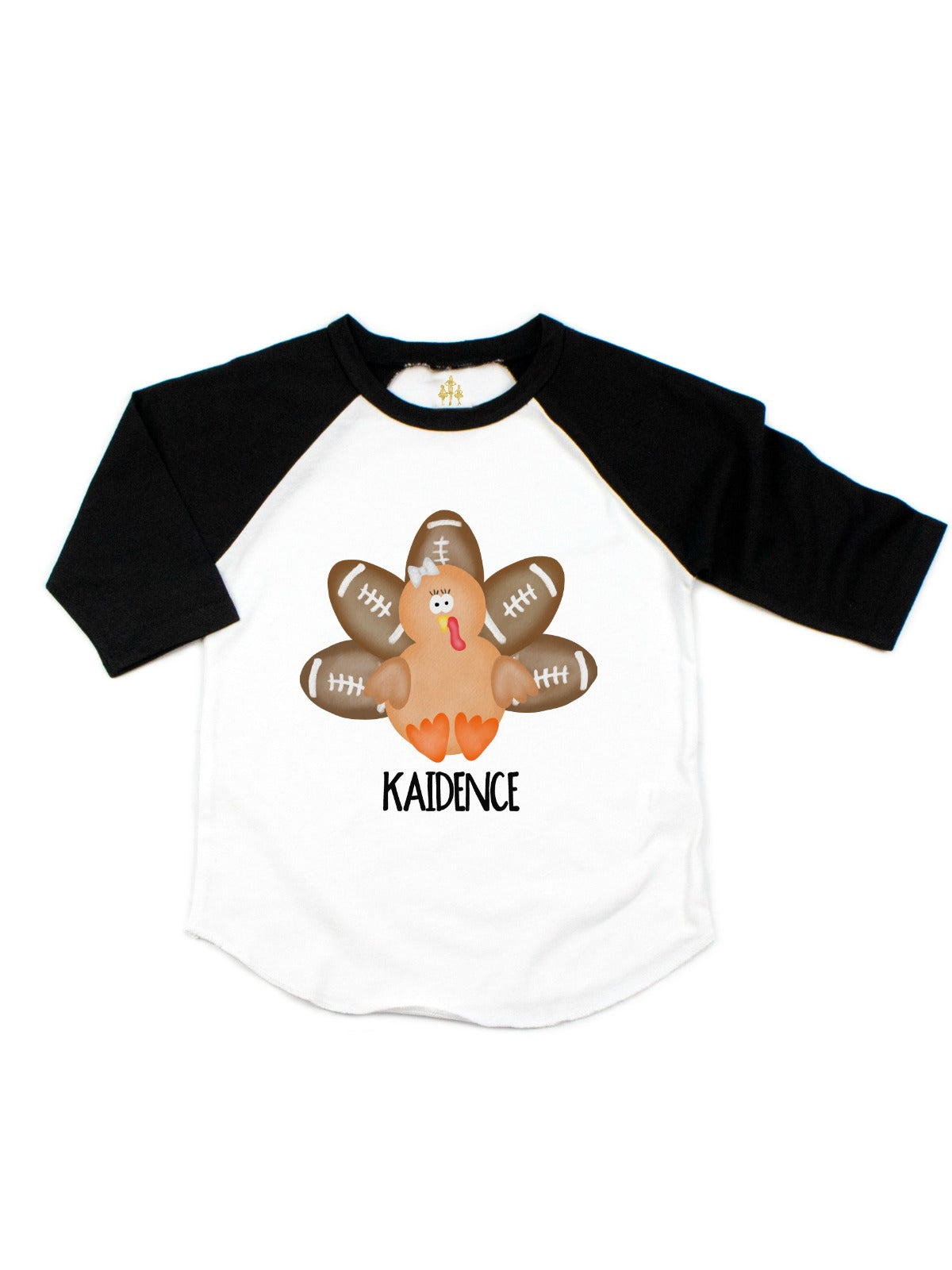 White and black kids raglan shirt with turkey with football feathers and bow
