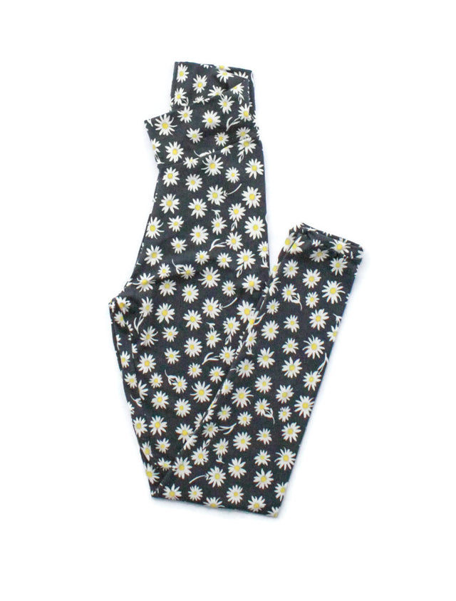 Black women’s leggings with white daisy floral print and yoga-style waistband