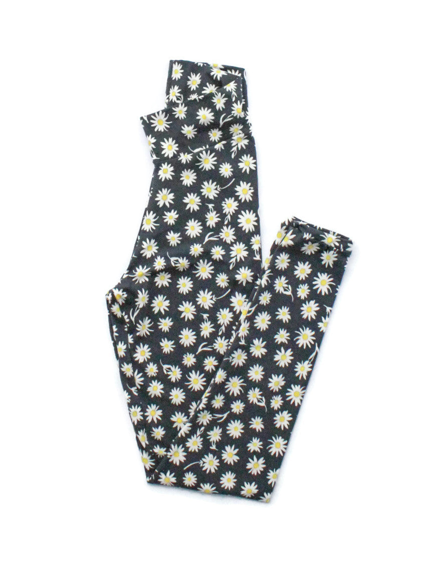 Black women’s leggings with white daisy floral print and yoga-style waistband