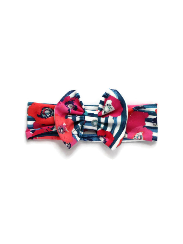 Twist-style headband with pink floral print and navy blue and white stripes