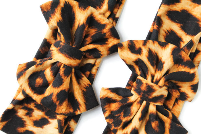 Matching mommy and me leopard print headbands with knotted bow design by Mackenzie Madison of Philadelphia