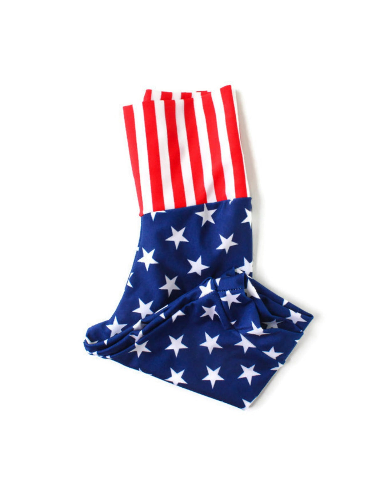 Girls’ red, white, and blue biker shorts with white stars on a navy background and red stripes on waistband